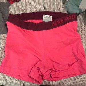 Pink and marron Nike Pros